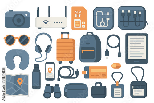 Travel accessories including electronics and essentials organized for a trip in a flat lay arrangement