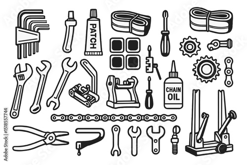 Collection of bicycle repair tools arranged for maintenance during daylight hours