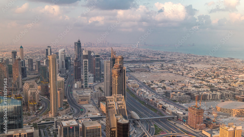 Obraz premium Dubai Downtown skyline futuristic cityscape with many skyscrapers and Burj Khalifa aerial timelapse.