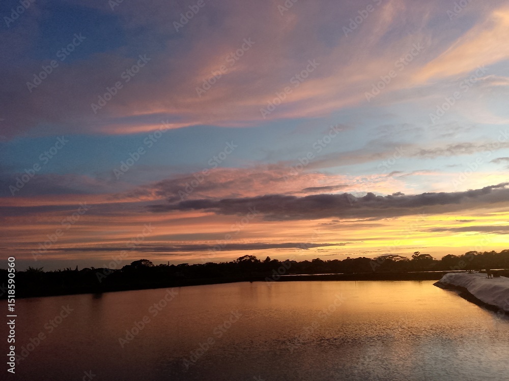 Obraz premium sunset over the river