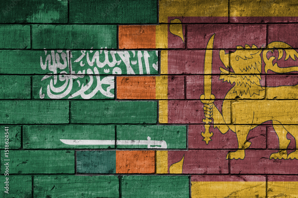Fototapeta premium colourful painted big national flag of saudi arabia and flag of sri lanka on a massive old brick wall background. concept
