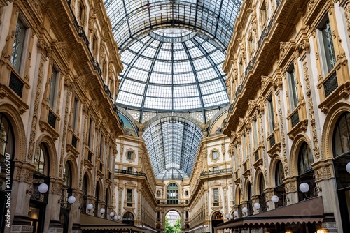 Milan, Italy Galleria Vittorio Emanuele II. Grand architecture and stunning glass ceiling in historic shopping galleria.