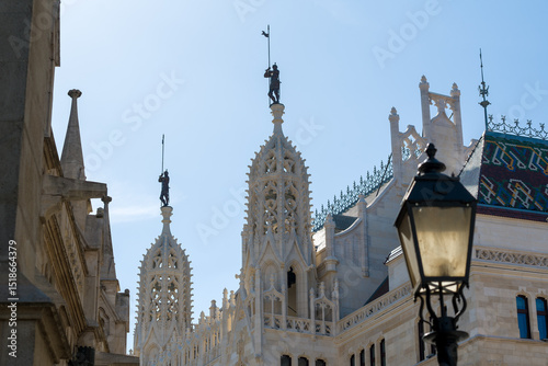 Stone carved rooftop decoration of historical buildings. Castle hill, Budapest