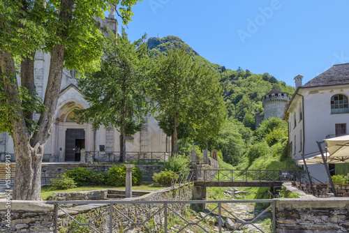 Ancient town of Vogogna with the Visconteo Castle, just above are visible the ruins of the ancient fortress dating back to the 9th - 10th century and left, the Sacred Heart of Jesus Parish Church  photo