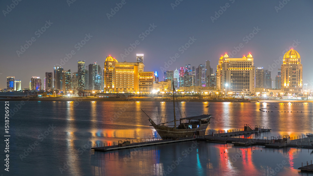 Fototapeta premium View from Katara Beach day to night timelapse in Doha, Qatar, towards the West Bay and city center
