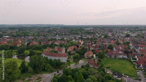 A panoramic drone view of the city and the castle, which sits on the water, in Steinfurt, Germany (Wasserschloss Burgsteinfurt)
