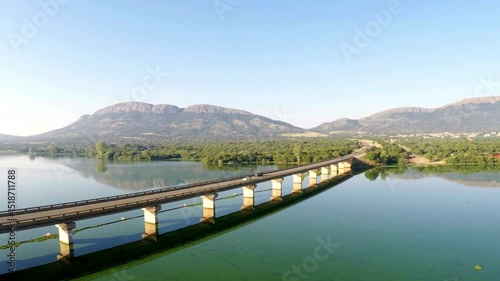 Wallpaper Mural Panoramic View of a Bridge Spanning a Serene Lake and Mountains Torontodigital.ca