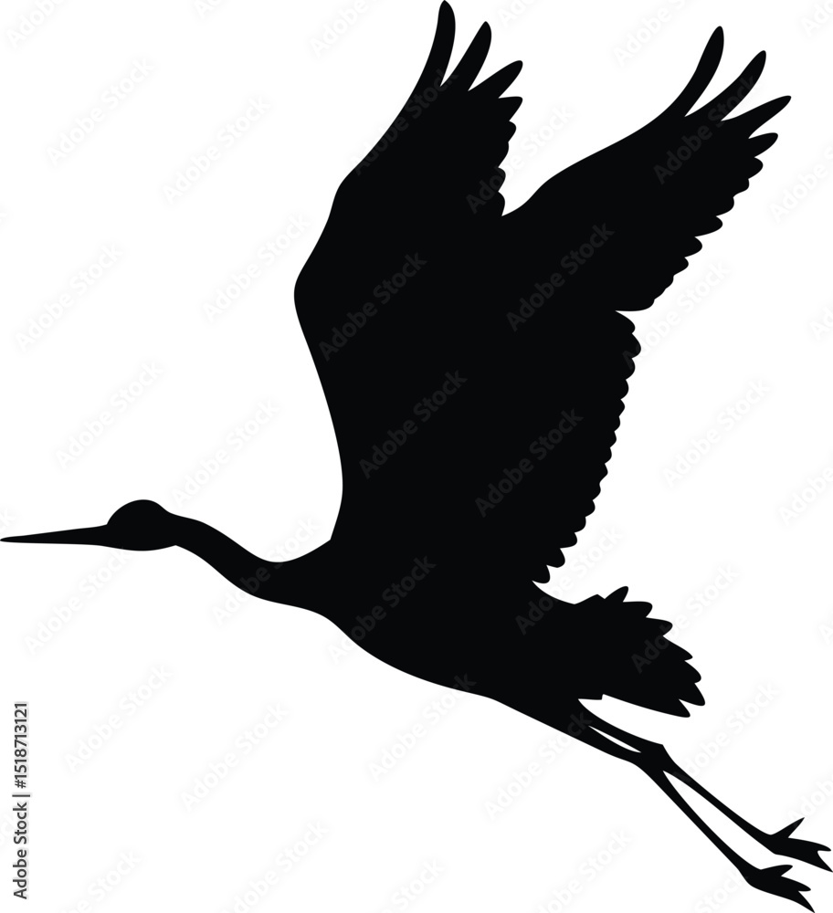 Obraz premium a black silhouette of a crane in flight isolated