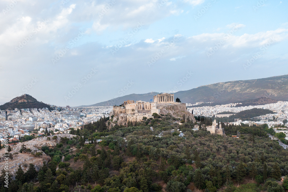 Fototapeta premium Aerial View of the Acropolis and the Athens Cityscape in Greece with Forest Trees