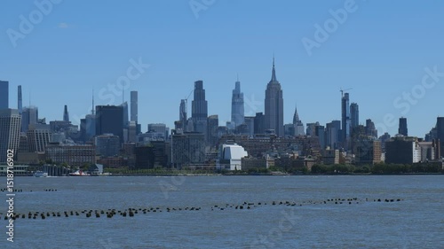 New York City, USA - May 21, 2025: A view of midtown Manhattan across the Hudson River.
