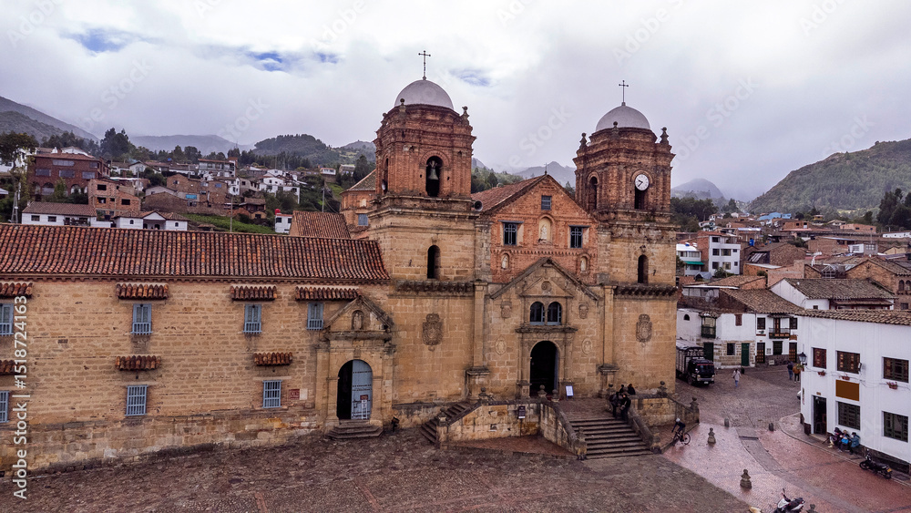 Fototapeta premium Mongui, Boyaca - Colombia. May 10, 2025. Panoramic drone view of the town's main church.