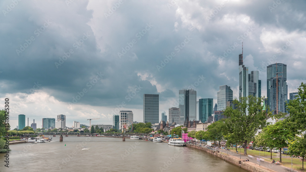 Fototapeta premium Hyperlapse of the historical Eiserner Steg or Iron Bridge over the Main River in Frankfurt, Germany