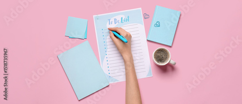 Female hand with to do list...
