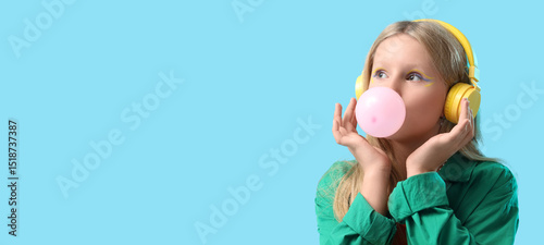 Cute trendy girl in headpho...