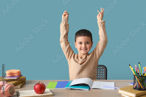 Happy little boy doing home...