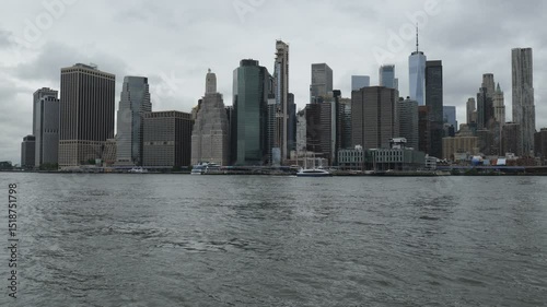 New York City, USA - May 21, 2025: A view of downtown Manhattan from East River.
