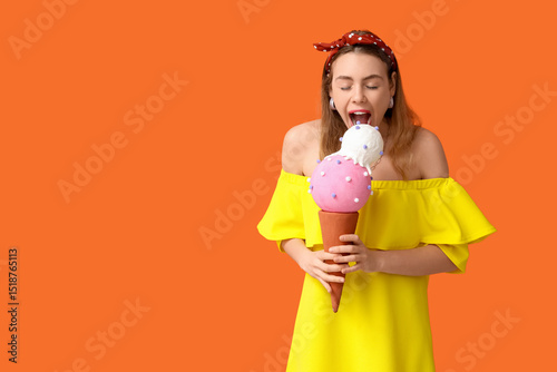 Young woman biting toy ice ...