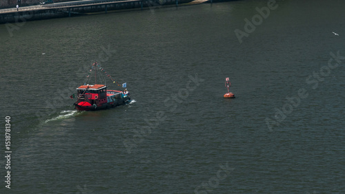 Passengers in a cruise on the Douro river in Tourist boat in Porto, Portugal timelapse