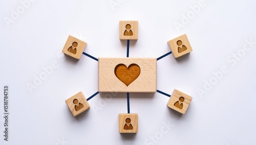 Wooden blocks connected by lines with a central block featuring a heart cutout symbolizing connection and relationships among people