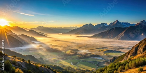 Golden Sunrise Over Misty Valley and Mountain Range