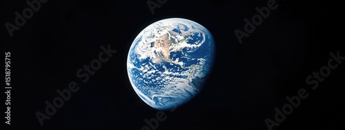 View of the circle Earth as seen by the Apollo 17 crew traveling toward the moon 