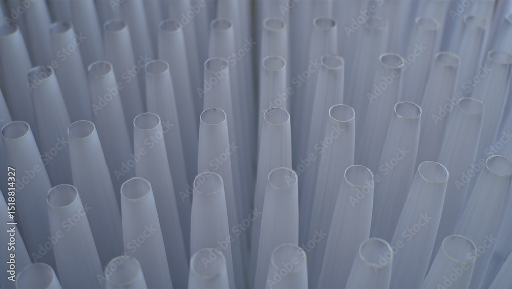 Obraz premium Abstract arrangement of numerous light gray conical tubes