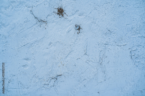 Textura de pared de cemento pintada de azul con marcas y desgaste natural