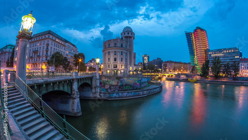 Photography Urania and Danube Canal day to night timelapse in Vienna.