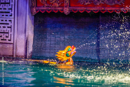 Traditional Vietnamese water puppet dolls theatre show in Hanoi, Vietnam, water puppetry doll show, in Thang Long theatre , one of the most traditional water puppet show in Hanoi, Vietnam.