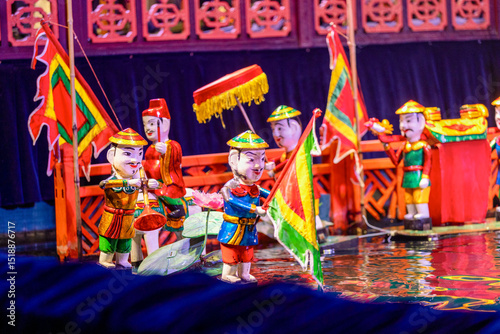 Traditional Vietnamese water puppet dolls theatre show in Hanoi, Vietnam, water puppetry doll show, in Thang Long theatre , one of the most traditional water puppet show in Hanoi, Vietnam.