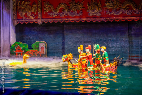 Traditional Vietnamese water puppet dolls theatre show in Hanoi, Vietnam, water puppetry doll show, in Thang Long theatre , one of the most traditional water puppet show in Hanoi, Vietnam.
