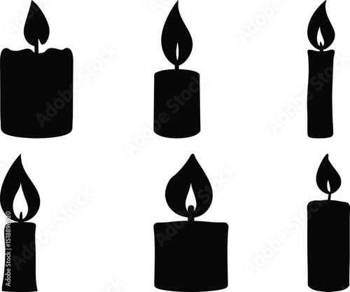 Silhouette of Six Lit Candles in Varying Shapes and Sizes on White