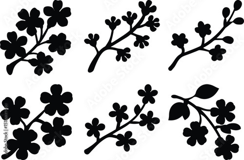 Collection of various black silhouettes of flowering branches on a white background