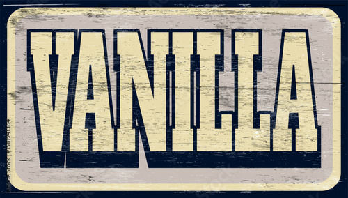 Aged and worn vanilla sign on wood
