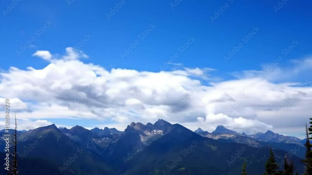 Stunning Mountain Range Landscape Under a Vivid Blue Sky with Puffy Clouds Stunning Mountain Range Landscape Under a Vivid Blue Sky with Puffy Clouds