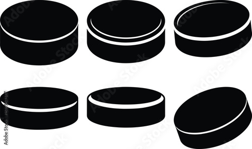 Silhouette of a Group of Hockey Pucks from Varying Angles on White
