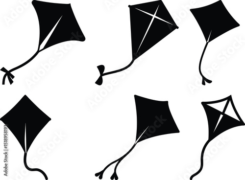 Silhouette assortment of kites in different shapes, sizes, and styles in air