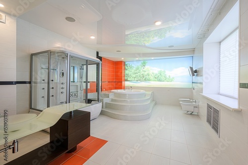 modern bathroom with white tiles, a glass shower, a jacuzzi on a raised platform, and a large tropical scene mural. Natural light enters through a window