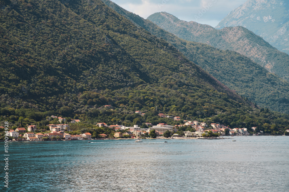 Fototapeta premium Mountain landscape with lake and cloudy sky