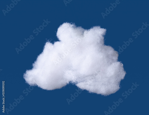 Siliconized hollowfiber, polyester fiber cloud held against a blue background