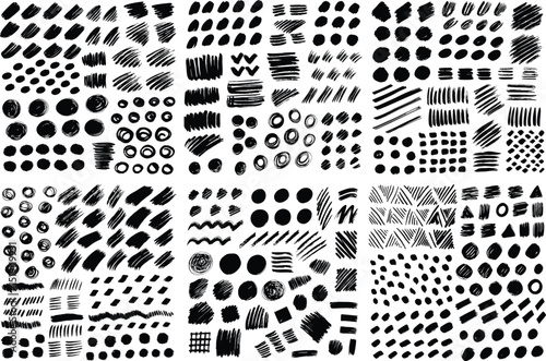 Large collection of black ink brush strokes and shapes.