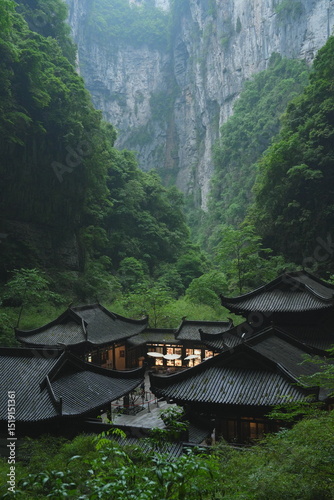 Three Natural Bridges with antique tavern in fog surround with green mountain with cold weather at Chongqing, China