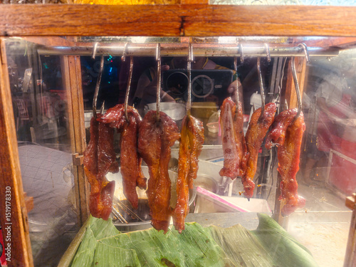 030625-056-a bunch of meat hanging from a wooden frame Prachuap Khiri Khan