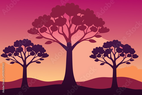 Vibrant orange sunset over a silhouetted tree in an autumn landscape