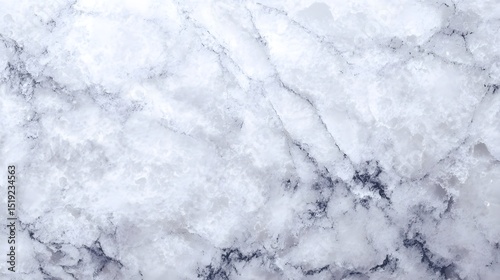Elegant marble surface with a soft neutral tone and subtle cloudy mineral patterns creating a clean and sophisticated background texture