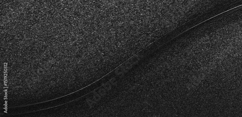 very dense, granular, and slightly rough textured monochromatic close-up with dramatic lighting.