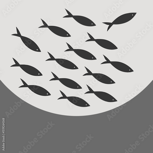 School of fish swimming in grey waters