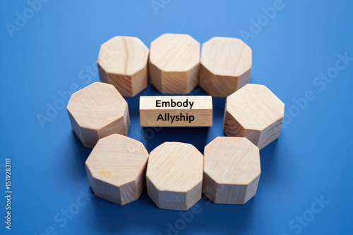Wooden blocks embody allyship phrase minimalist concept support foundation social justice idea, Selective Focus..