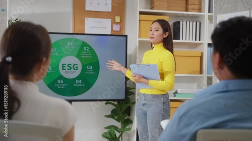 A group of business professionals stands in a modern corporate office, actively engaged in an ESG-focused brainstorming session, analyzing convergent strategies with agile planning methods 
