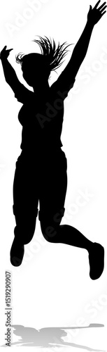 A happy woman jumping for joy in mid air silhouette person concept